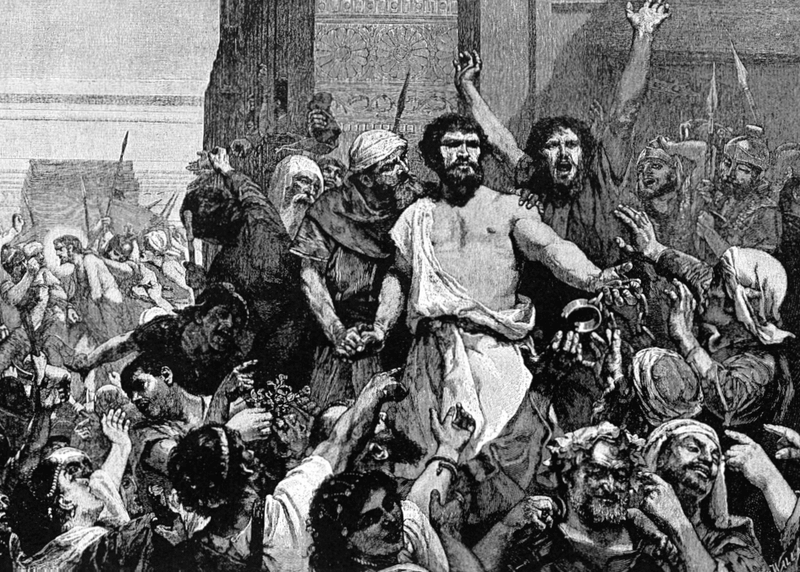 Barabbas is freed from his chains, and Jesus substitutes his life for Barabbas