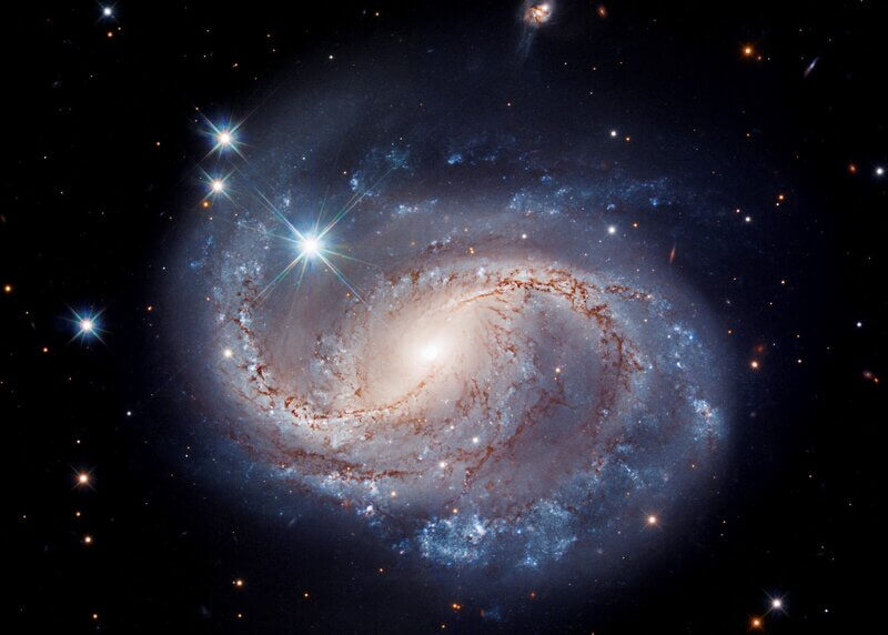 Spiral galaxy demonstrating power, uniformity, complexity, and order in the universe, which are evidences of God's existence