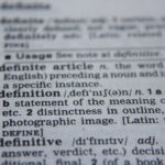 Open dictionary showing definitions of words, as discussed in the article, misleading definitions exist for some important Christian words